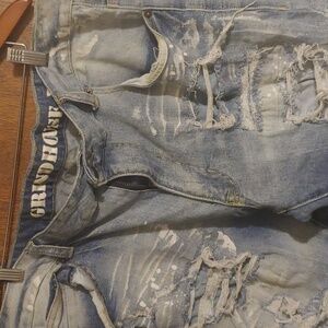 Distressed Blue Denim Jeans